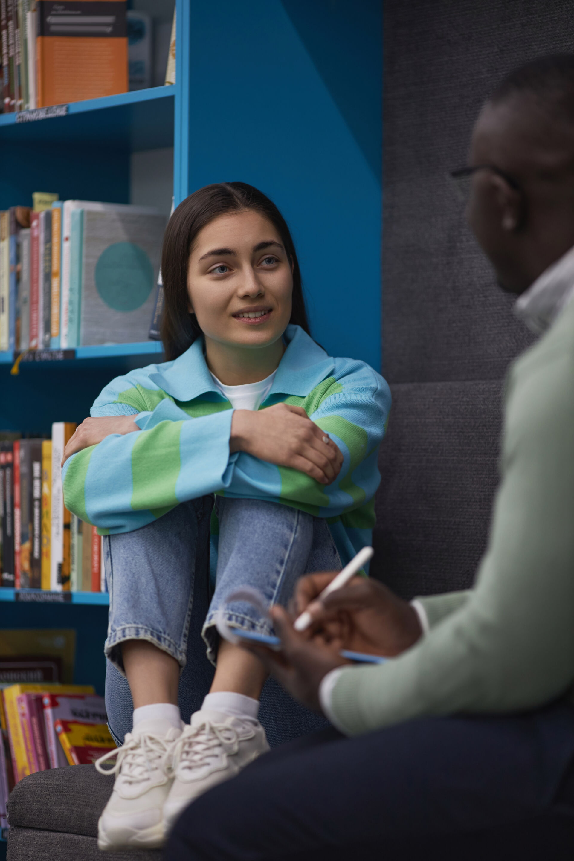Safeguarding Children in Specialist Residential Care stressed teenage girl talking to mental health therapist