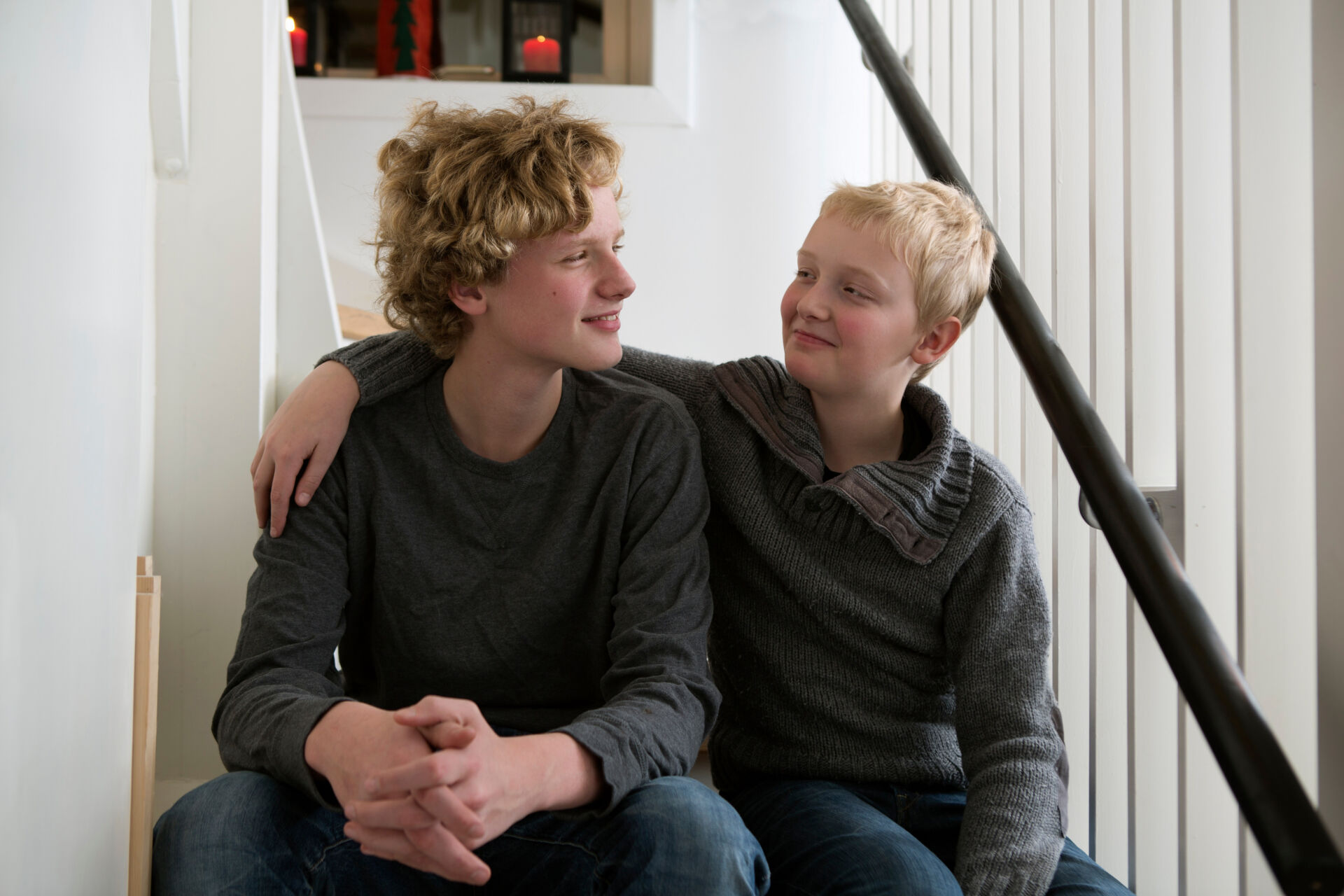 Safeguarding Children in Specialist Residential Care Boys sitting on stairs together